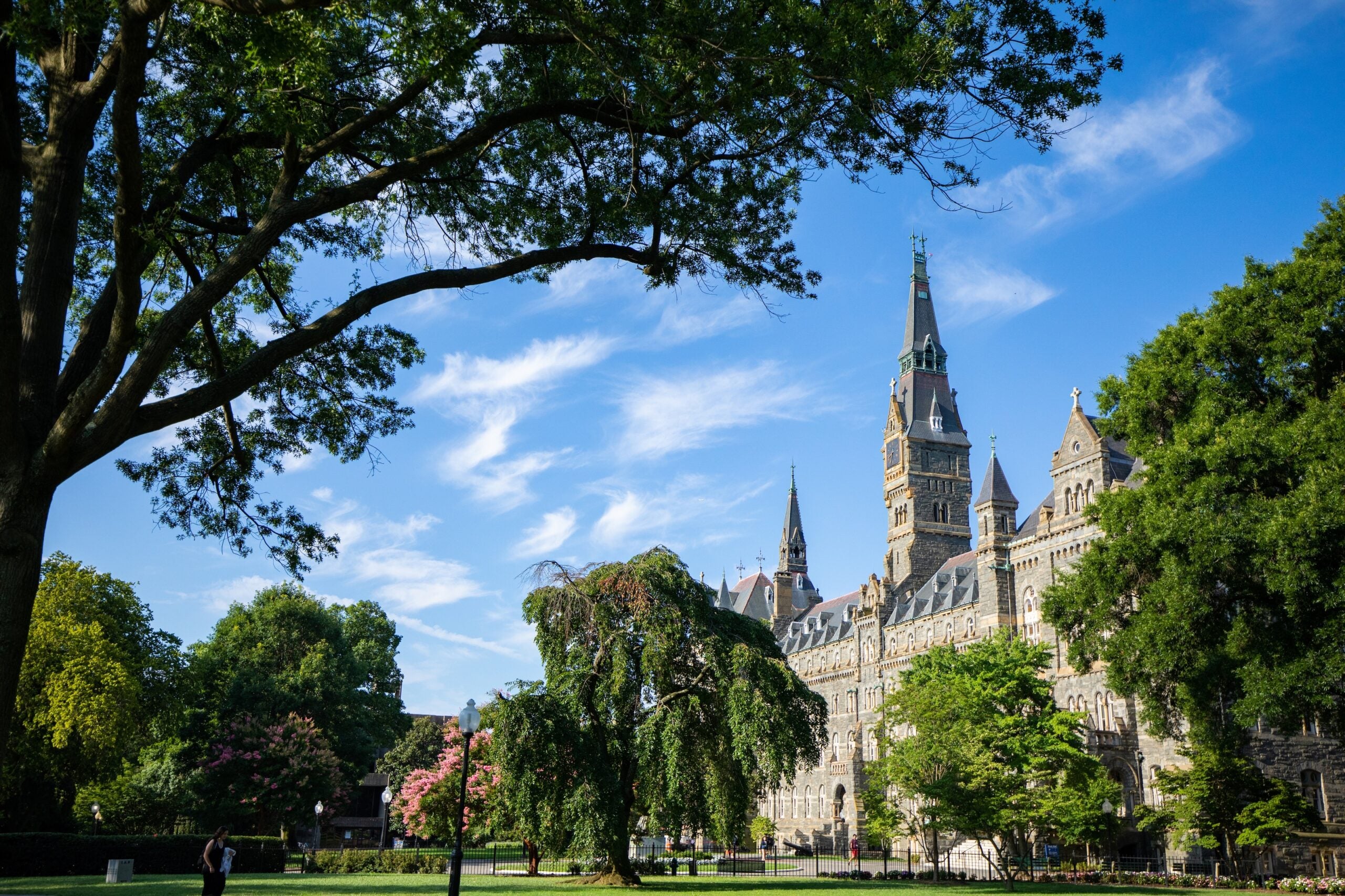 Healy Hall, a gothic 19th century building, on a bright spring day, as a geographic representation of Georgetown University.